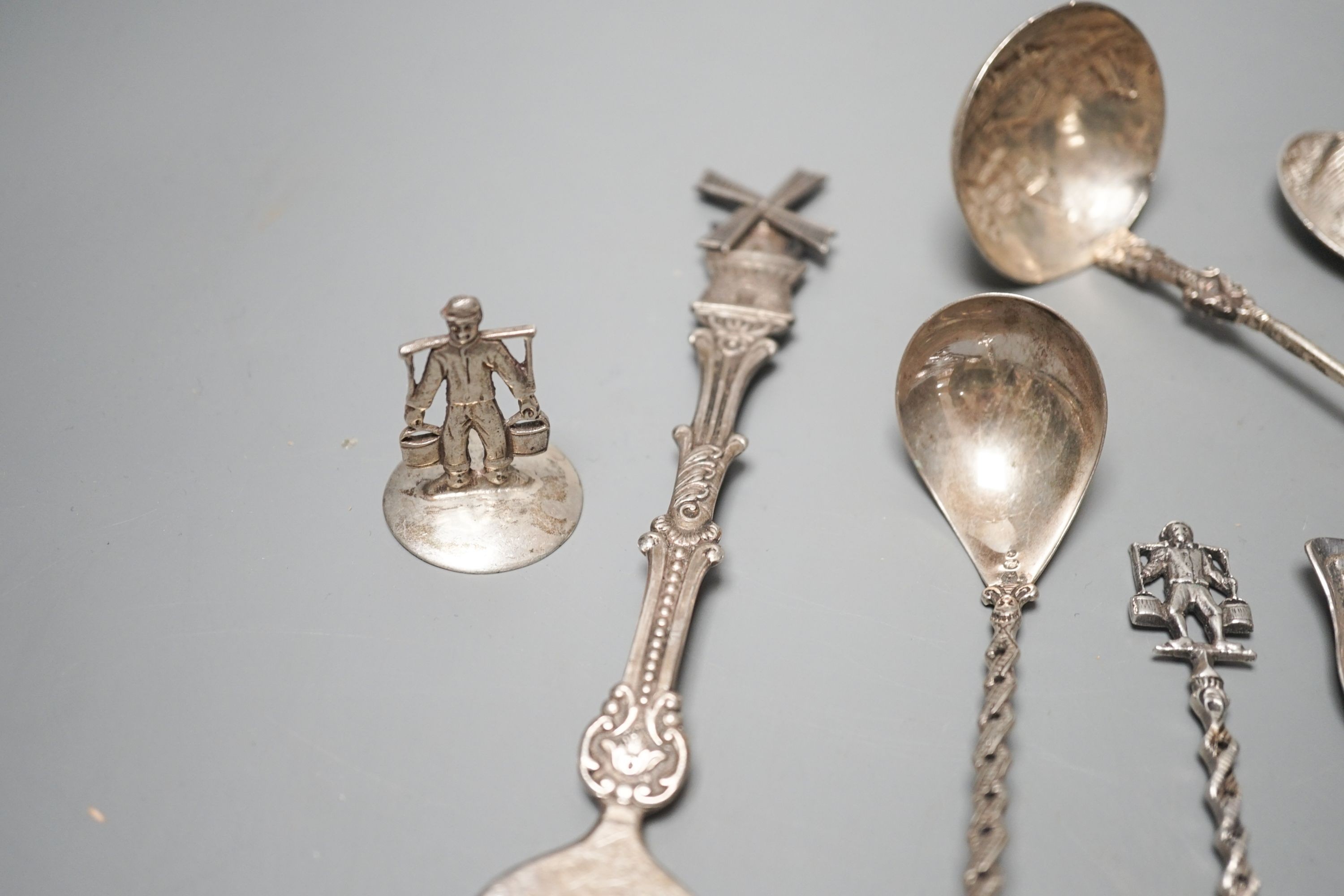 A small group of assorted mainly Dutch white metal spoons.